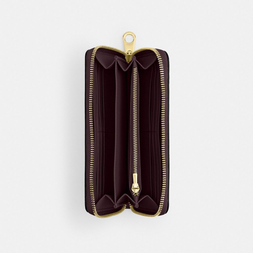 Long Zip Around Wallet In Signature Canvas