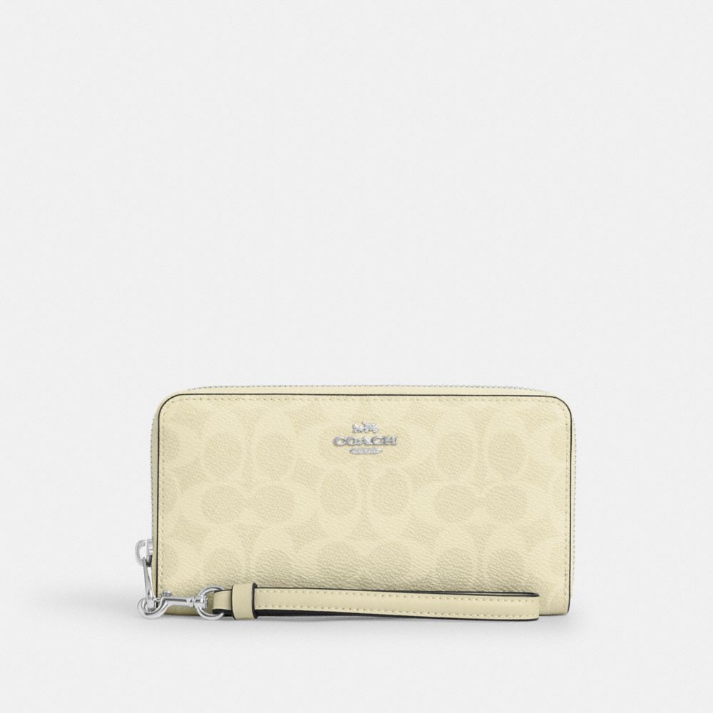 COACH®,LONG PORTEFEUILLE À FERMETURE ÉCLAIR SUR TOUT LE TOUR EN TOILE EXCLUSIVE,Toile exclusive,Argent/Foin,Front View