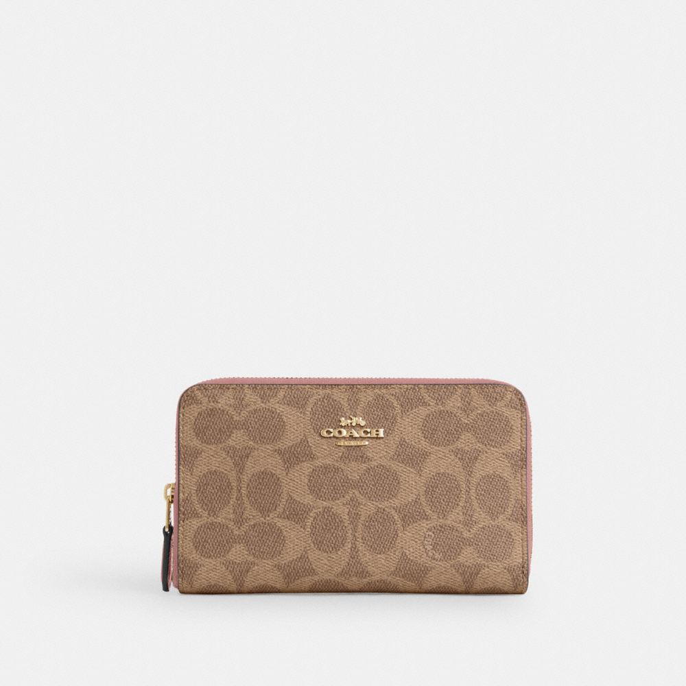 COACH® Outlet | Medium Id Zip Wallet In Signature Canvas