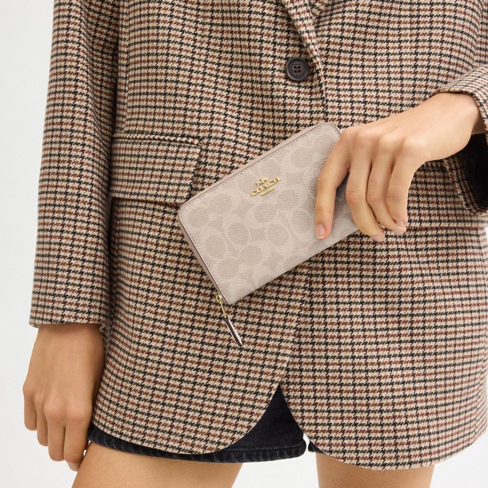 COACH®,Medium Id Zip Wallet In Signature Canvas,Continental,Coin,Bi Fold,Sustainable,Casual,Beige,Detail View