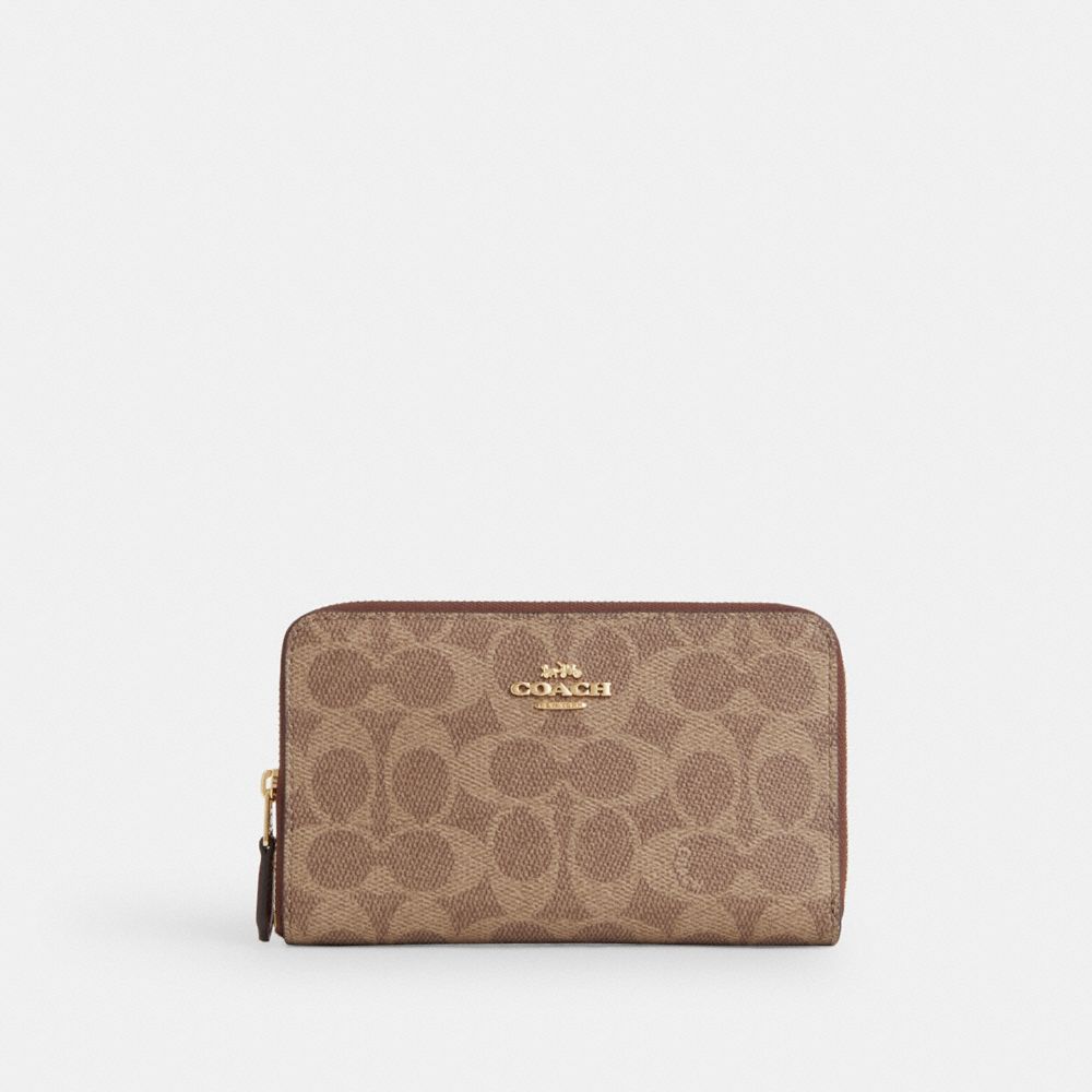 Gold Tan Brown Medium Id Zip Wallet In Signature Canvas