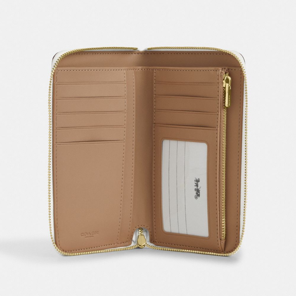 COACH®,Medium Id Zip Wallet In Signature Canvas,Coin,Bi Fold,Continental,Sustainable,Casual,White,Inside View,Top View