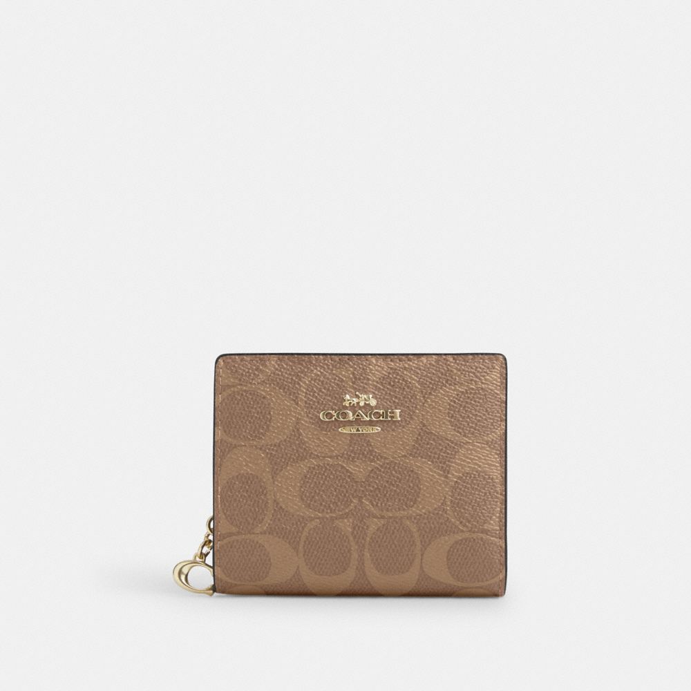 Tan coach wallet on sale