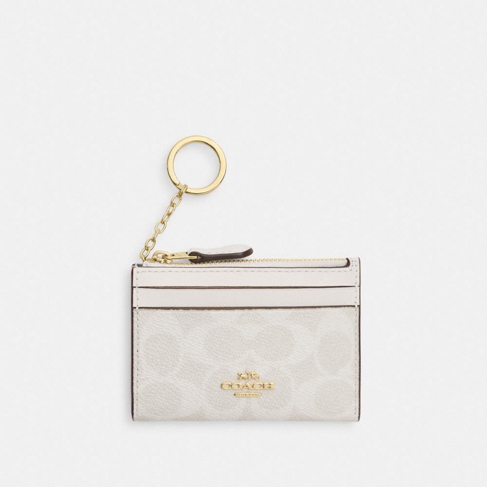 COACH®,ÉTUI-CARTES MINI SKINNY POUR PIÈCE D’IDENTITÉ EN TOILE SIGNATURE,Tissu en toile exclusif,Mini,Or/Blanc/Craie,Front View