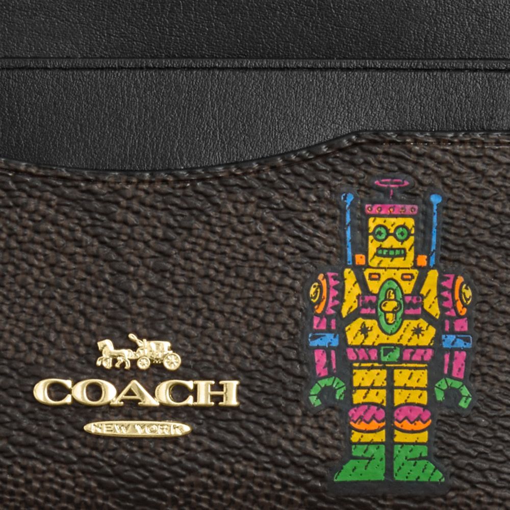 COACH®,Cosmic Coach Slim Id Card Case In Signature Canvas With Robot Print,Leather,Canvas,Card Case,Color Block,Casual,Black