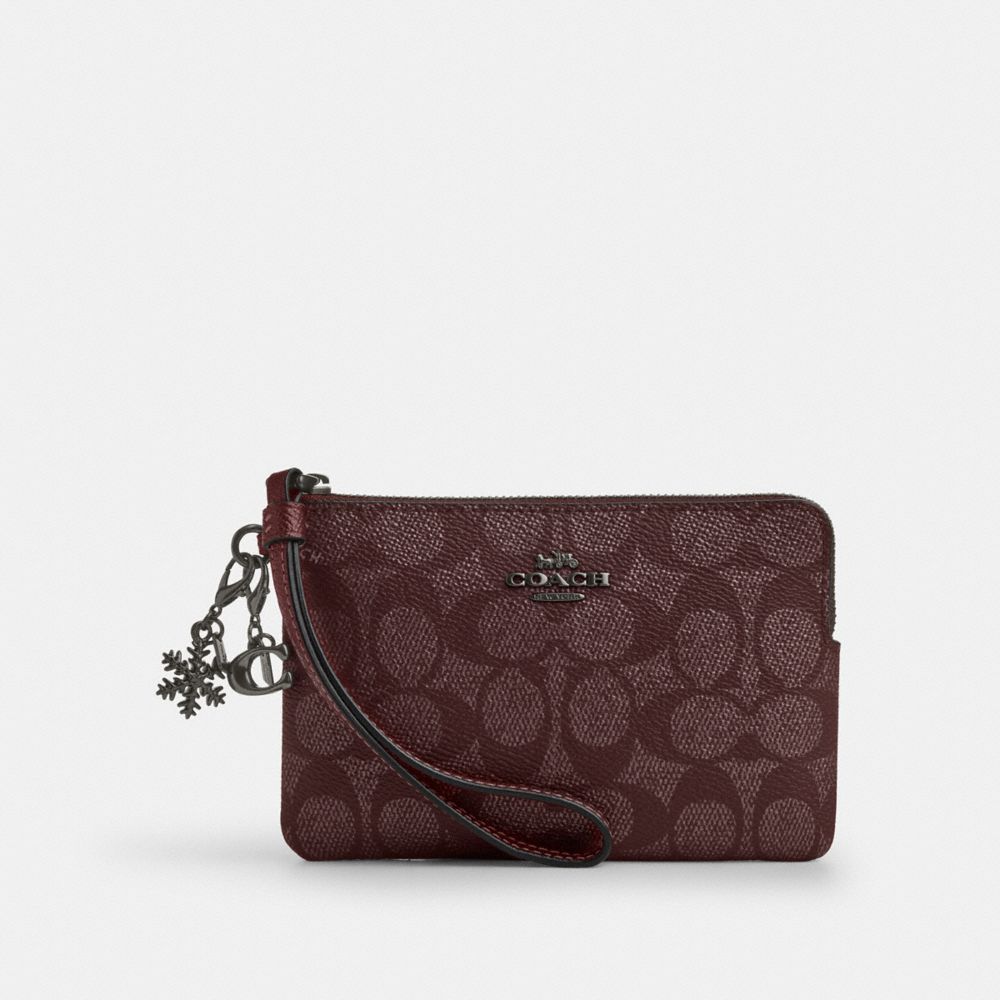 COACH®,Boxed Corner Zip Wristlet In Signature Canvas With Charms,,Front View