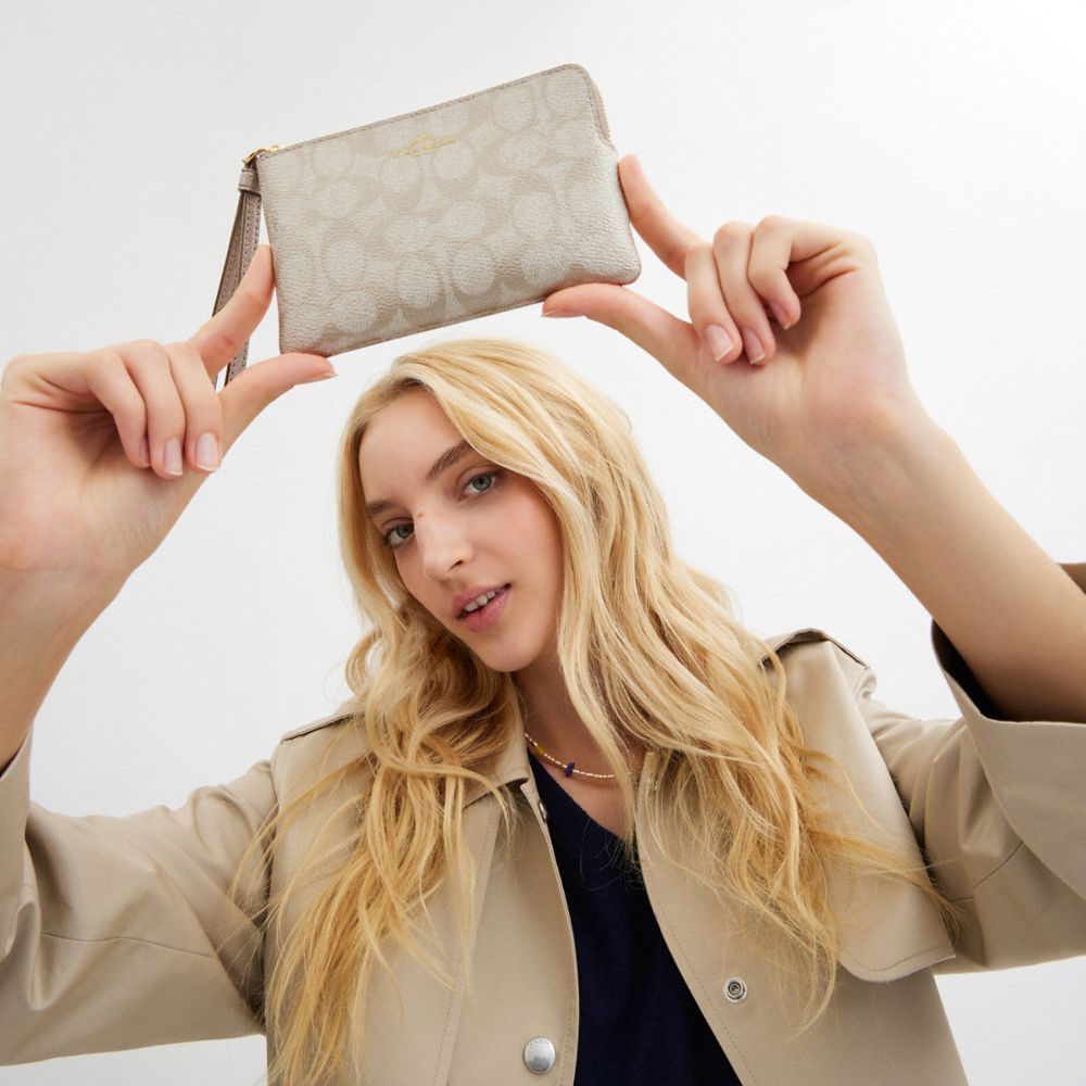 COACH®,Corner Zip Wristlet In Signature Canvas,Canvas,Metallic,Wristlet,Casual,Beige,Detail View
