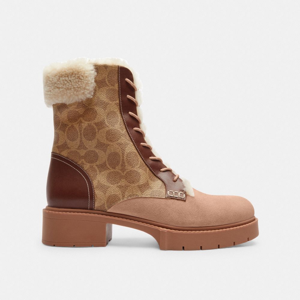 COACH®,Leighton Bootie In Signature Canvas,Rubber,Leather,Combat,Winter,Bootie,Mixed Media,Color Block,Shearling,Pull Tab,...,Brown,Angle View