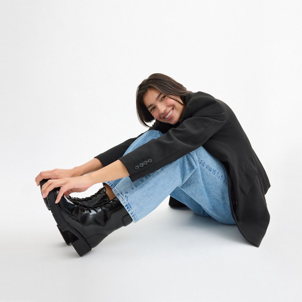 COACH®,Leighton Bootie,Leather,Rubber,Combat,Bootie,Pull Tab,Casual,Black,Detail View