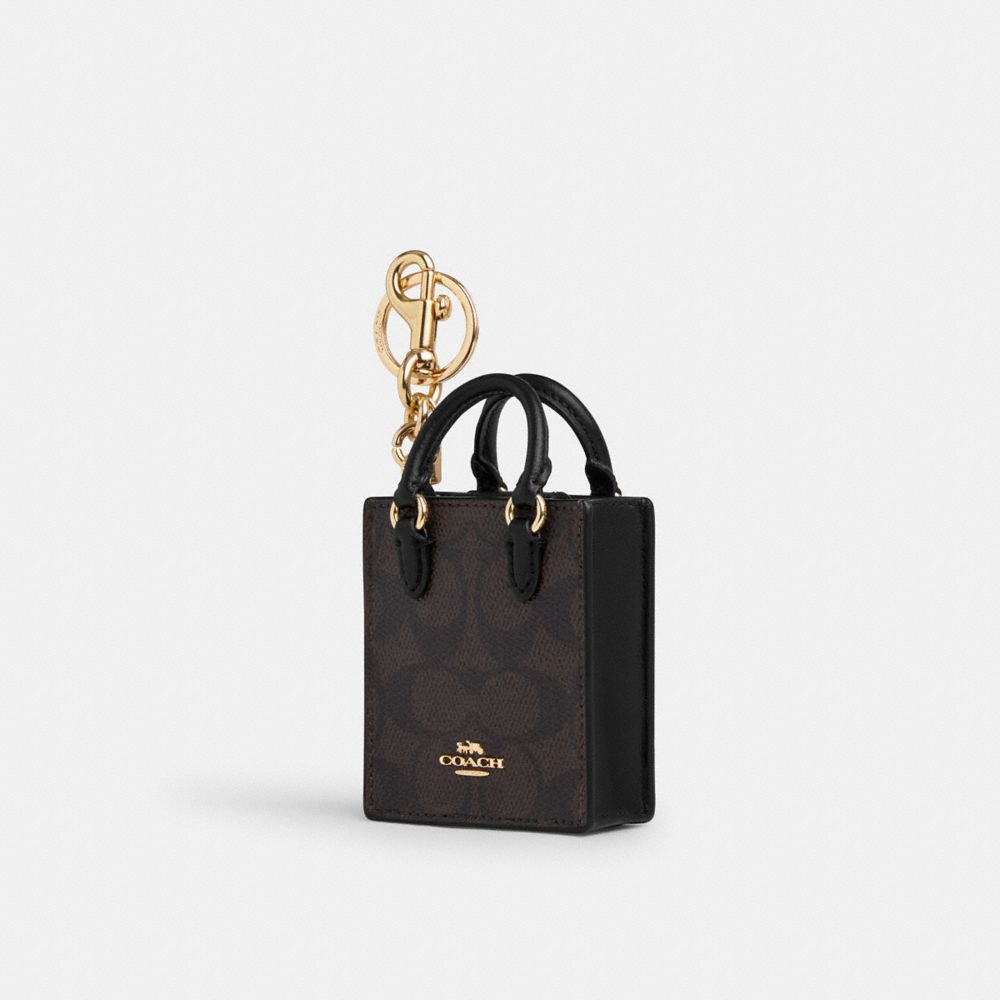 COACH®,North/South Mini Tote Bag Charm In Signature Canvas,Canvas,Bag Charm,Casual,Brown,Front View