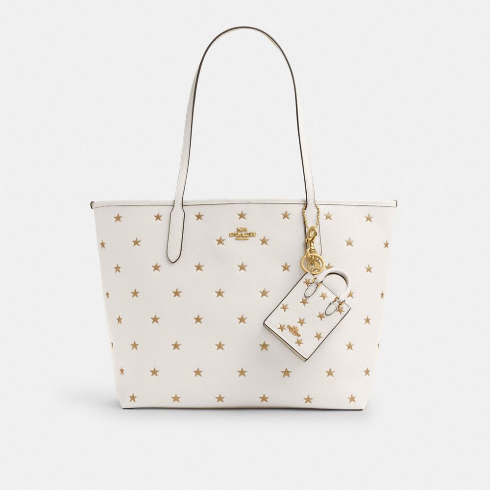 COACH®,North/South Mini Tote Bag Charm With Star Print,,Angle View