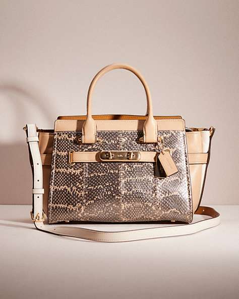 COACH®,RESTORED  SWAGGER 27 IN PEARLIZED SNAKESKIN,Light Gold/Platinum,Front View
