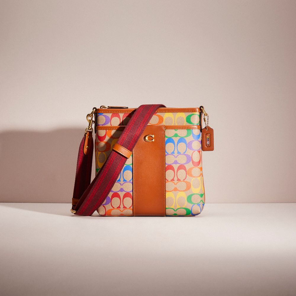Coach Restored Kitt Messenger Crossbody In Rainbow Signature Canvas In Brass/tan Natural Multi