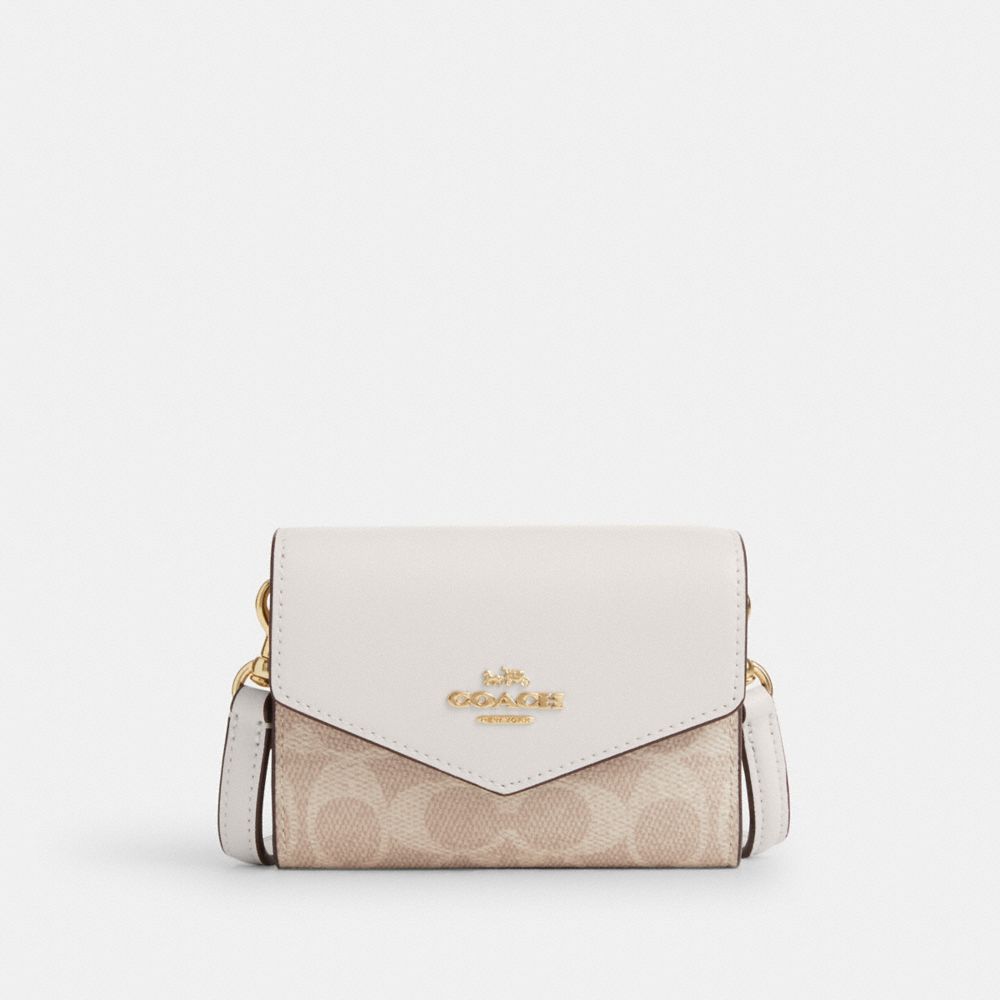 COACH®,Mini Envelope Wallet With Strap In Signature Canvas,,Front View