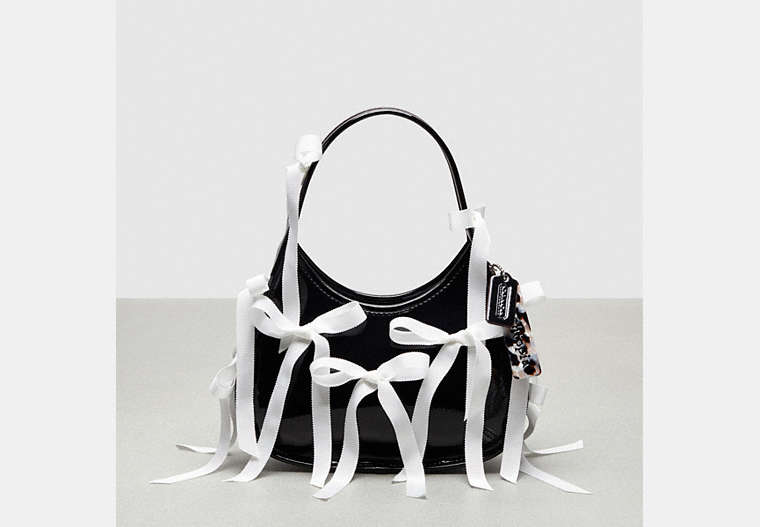 COACH®,Ergo Bag in Crinkle Patent Coachtopia Leather with Bows All Over,Black,Front View