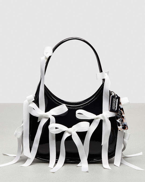 Ergo Bag In Crinkle Patent Coachtopia Leather With Bows All Over | Coachtopia ™