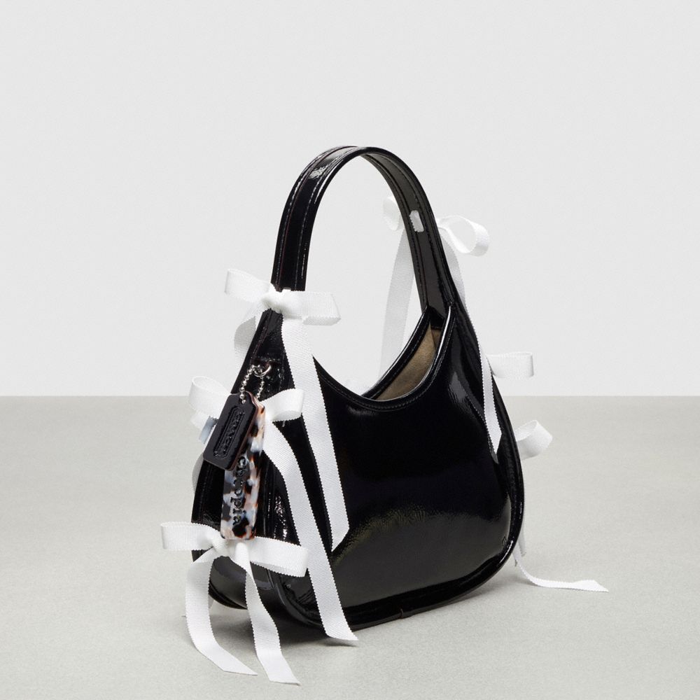 COACH®,Ergo Bag In Crinkle Patent Coachtopia Leather With Bows All Over,Bow Bags,Black,Angle View