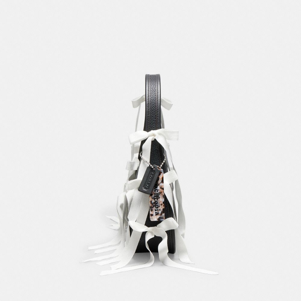 Coach Ergo Bag In Topia Leather With Allover Bows In Black/white