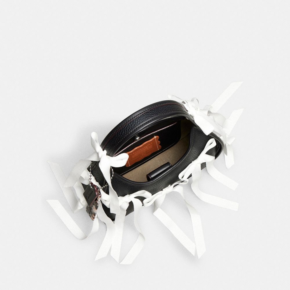 Coach Ergo Bag In Topia Leather With Allover Bows In Black/white