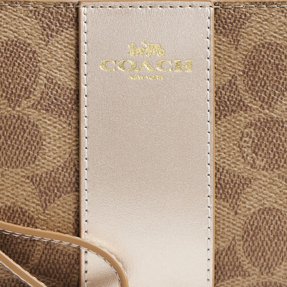 COACH®,Corner Zip Wristlet In Signature Canvas,Canvas,Leather,Wristlet,Faux Leather,Color Block,Casual,Brown