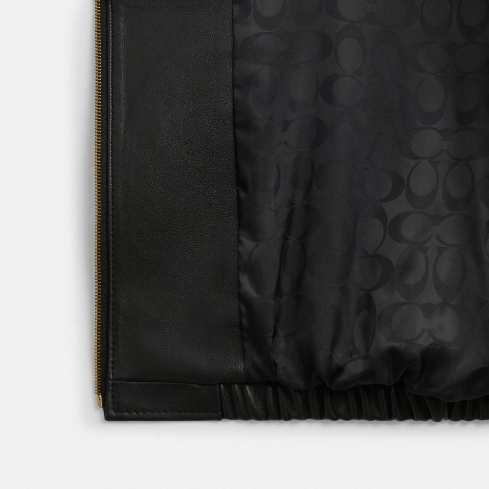 Женские куртки Coach Heritage C Plaque Oversized Leather Jacket — фото 2
