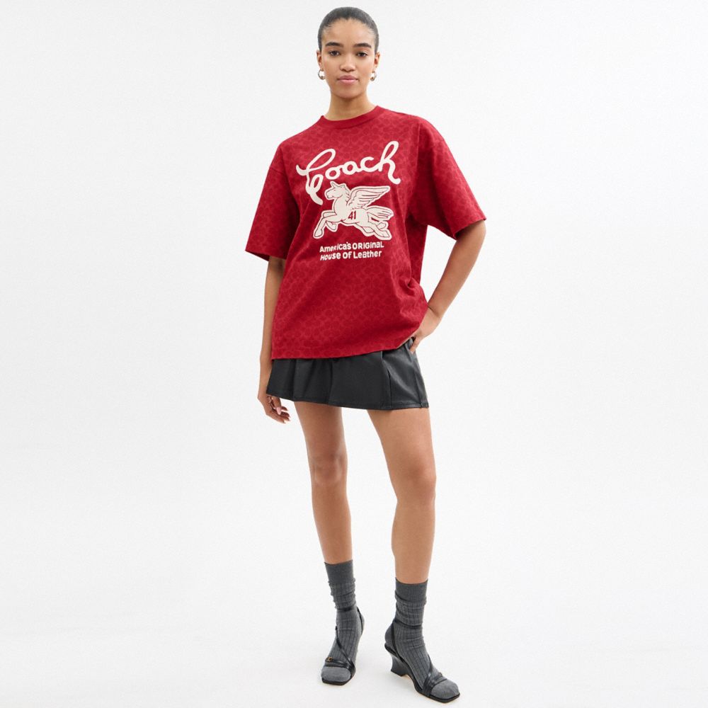 COACH®,Relaxed Signature Pegasus T Shirt In Organic Cotton,Organic Cotton,T Shirt,Sustainable,Casual,Red,Scale View