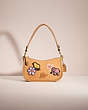 COACH®,RESTORED SWINGER 20 WITH CREATURE PATCHES,Glovetanned Leather,Brass/Light Tan Multi,Front View