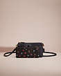 COACH®,RESTORED NOA POP-UP MESSENGER WITH BLOCKED FLORAL PRINT,Polished Pebble Leather,Brass/Black Multi,Angle View