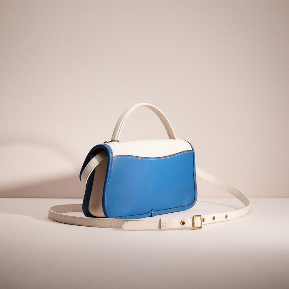 COACH®,Upcrafted Turnlock Clutch,Leather,Lining Leather,Denim,Satchel,Plastic,Ball Embellishment,Logo,Mixed Media,Piping,C...,Multi Color,Angle View