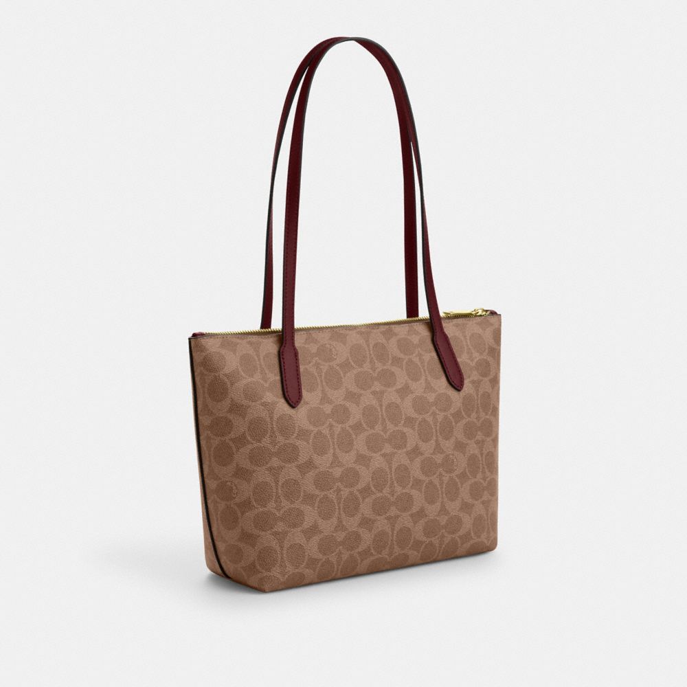 COACH®,Fiona Zip Tote Bag In Signature Canvas With Horse And Carriage Print,,Angle View