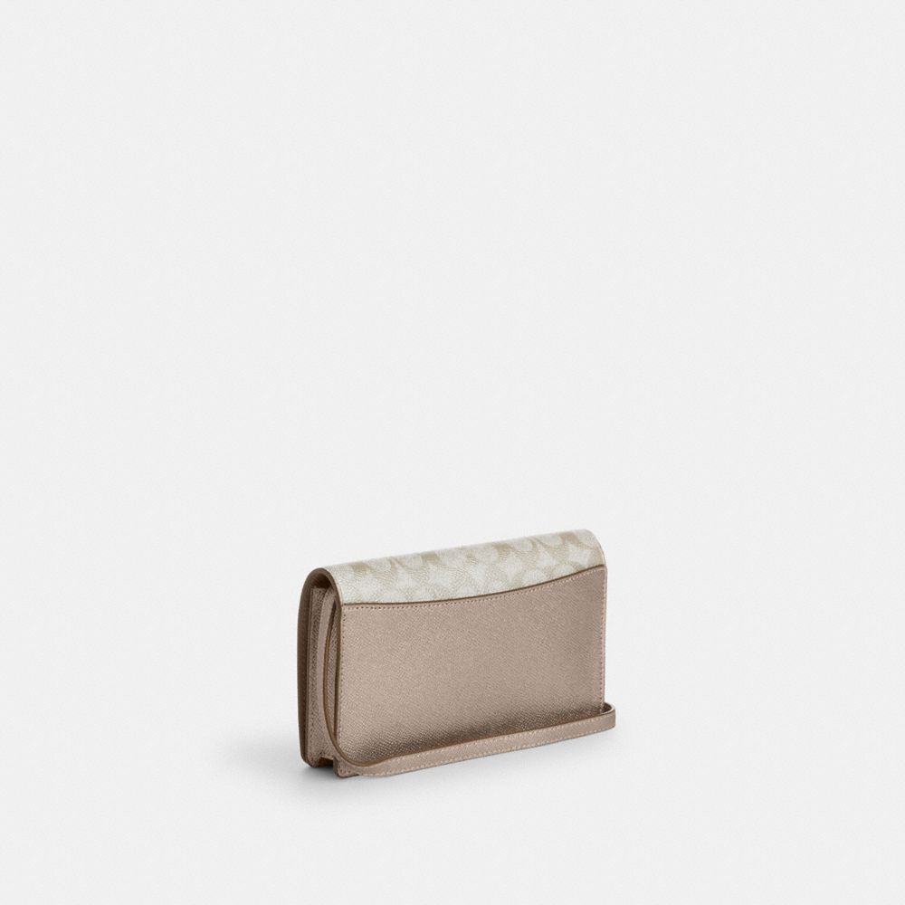 COACH®,Anna Foldover Clutch Crossbody Bag In Signature Canvas,Metallic,Canvas,Clutch,Continental,Crossbody,Color Block,Casual,Gray,Angle View