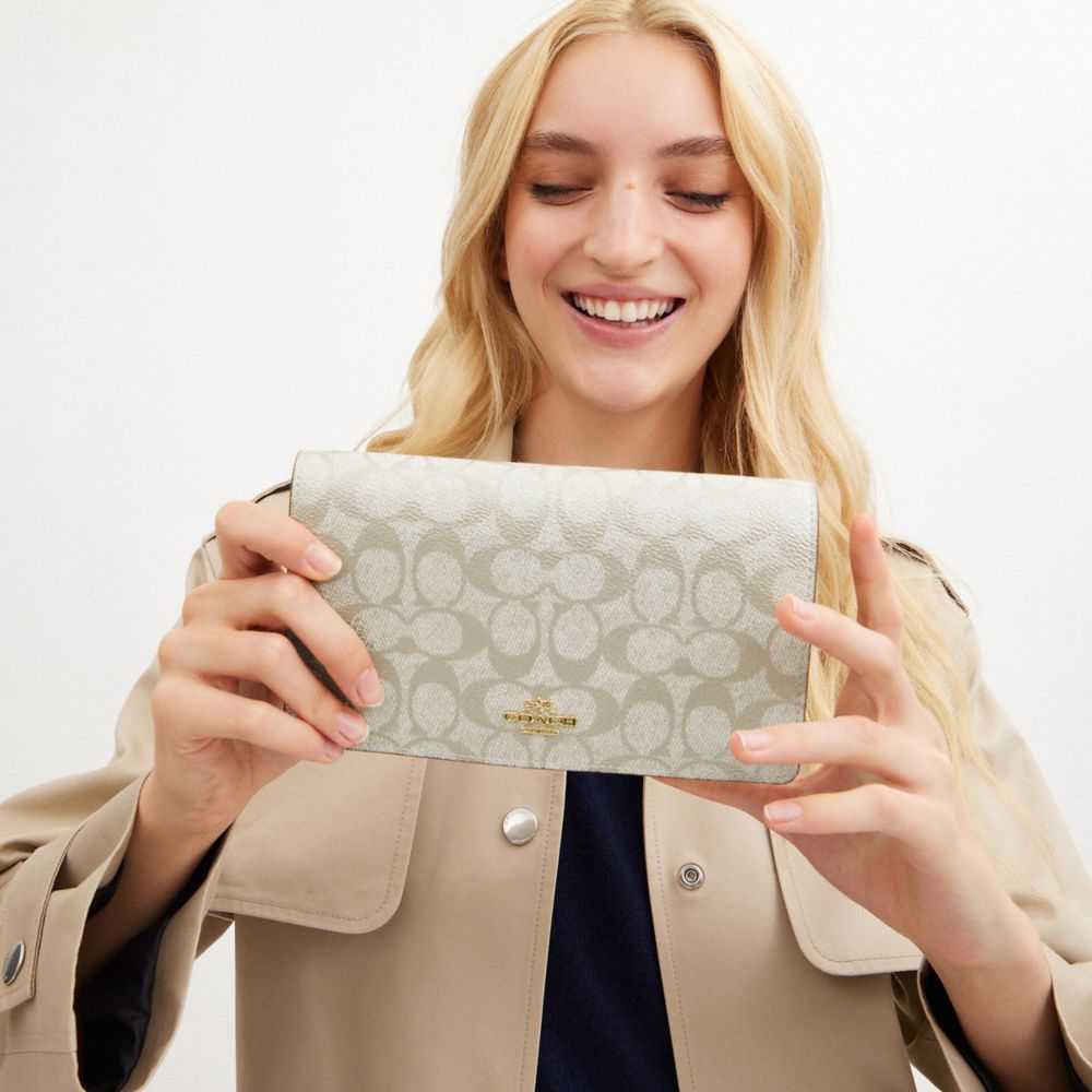 COACH®,Anna Foldover Clutch Crossbody Bag In Signature Canvas,Metallic,Canvas,Clutch,Continental,Crossbody,Color Block,Casual,Gray,Detail View