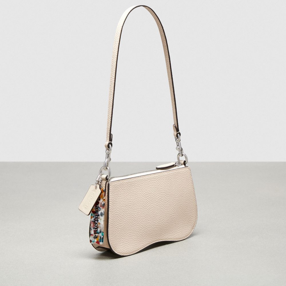COACH®,Wavy Shoulder Bag In Pebbled Coachtopia Leather,Leather,Shoulder Bag,Plastic,Logo,Adjustable,Vegan,Silver Metal,Casual,Cream,Angle View