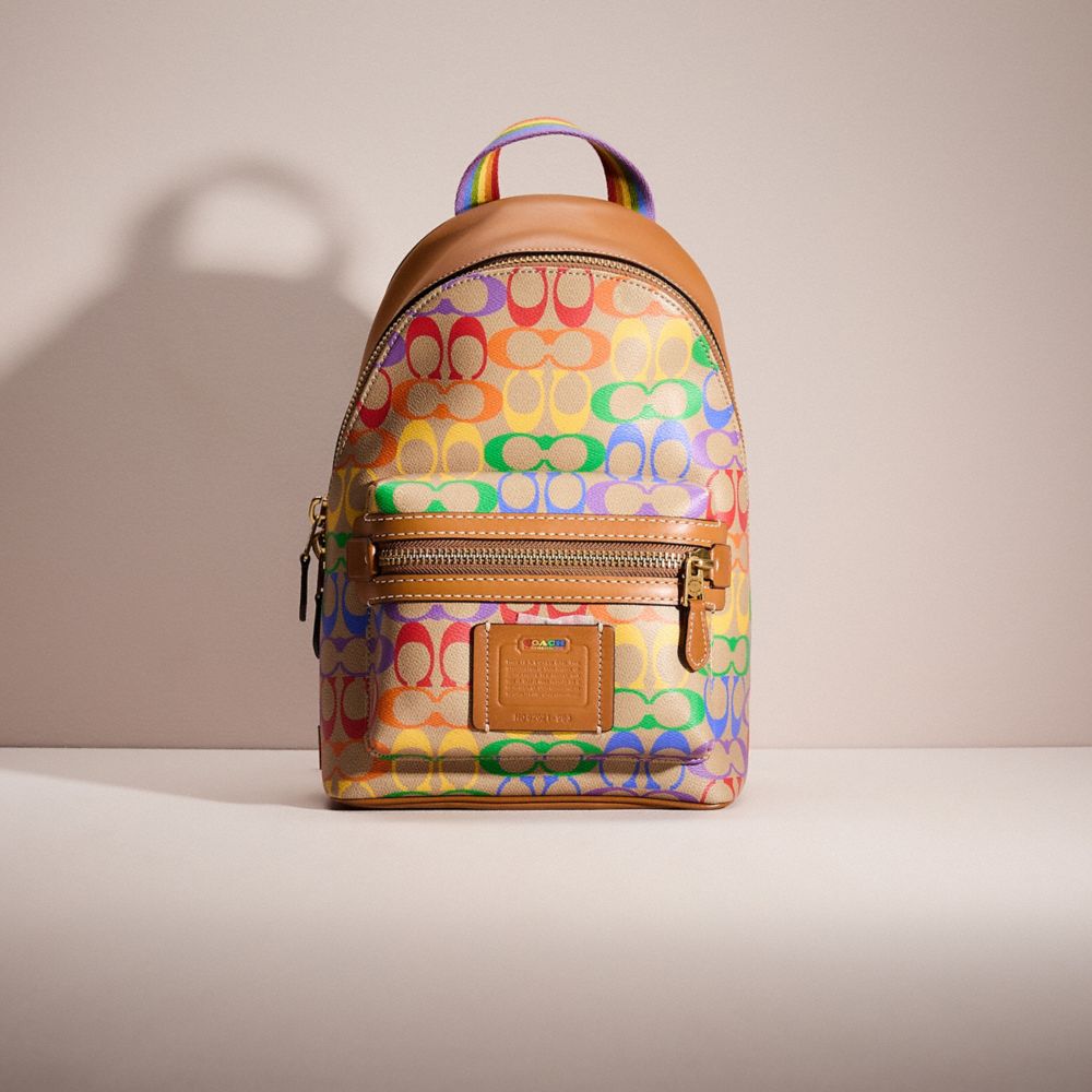 COACH®,RESTORED ACADEMY PACK IN RAINBOW SIGNATURE CANVAS,Brass/Multi,Front View