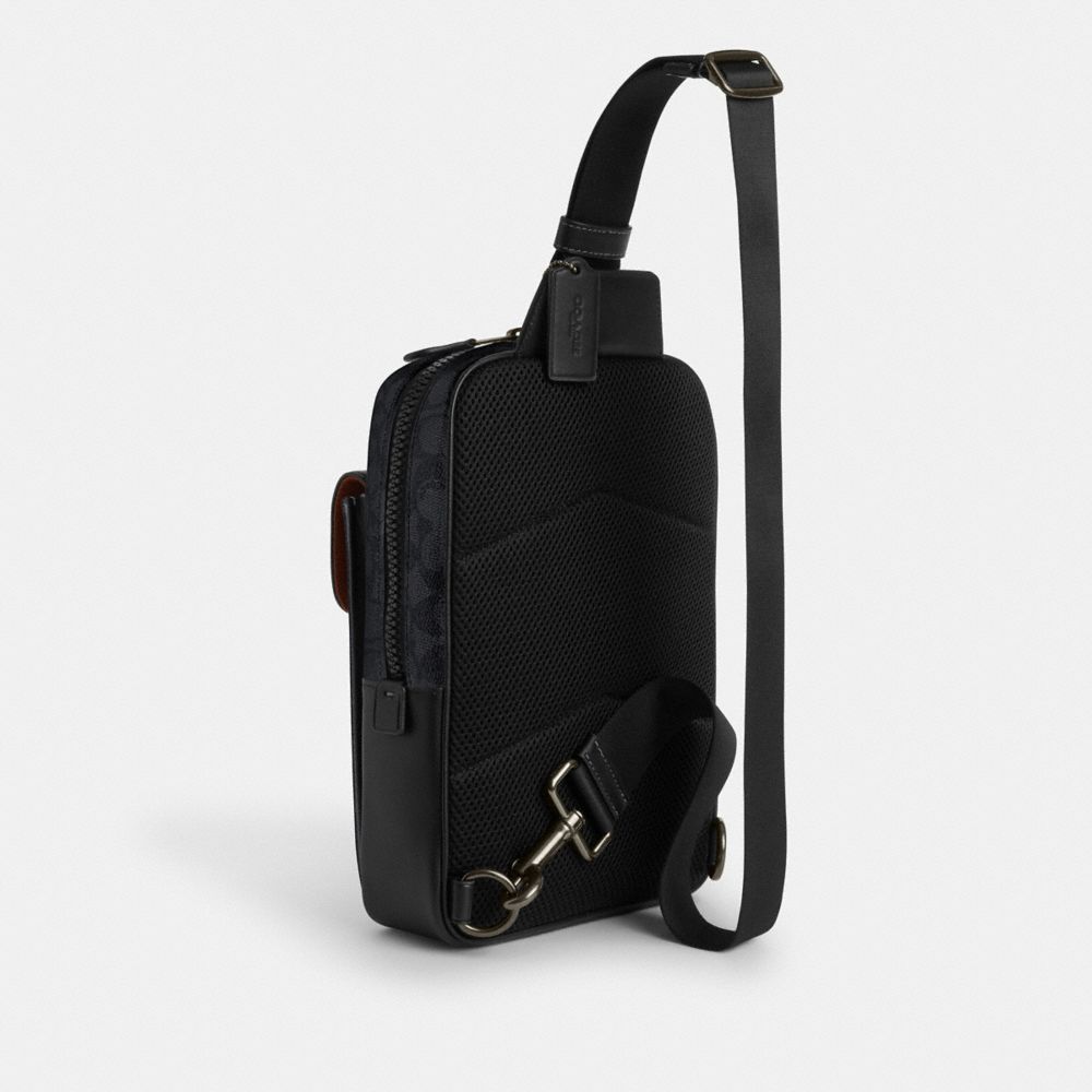 COACH®,Track Pack In Signature Canvas,Black,Angle View