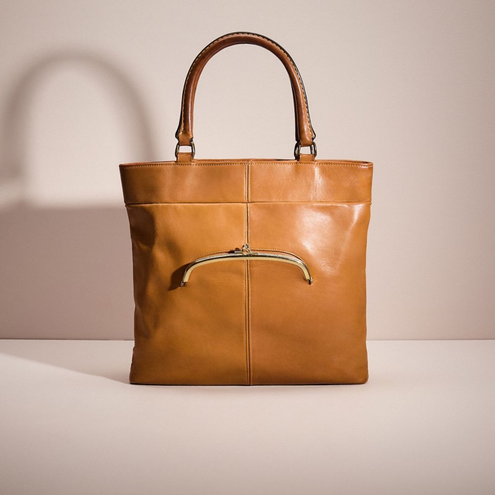 COACH®,VINTAGE CASHIN CARRY SKINNY TOTE,Glovetanned Leather,Medium,Bonnie Cashin Edit,Saddle,Front View