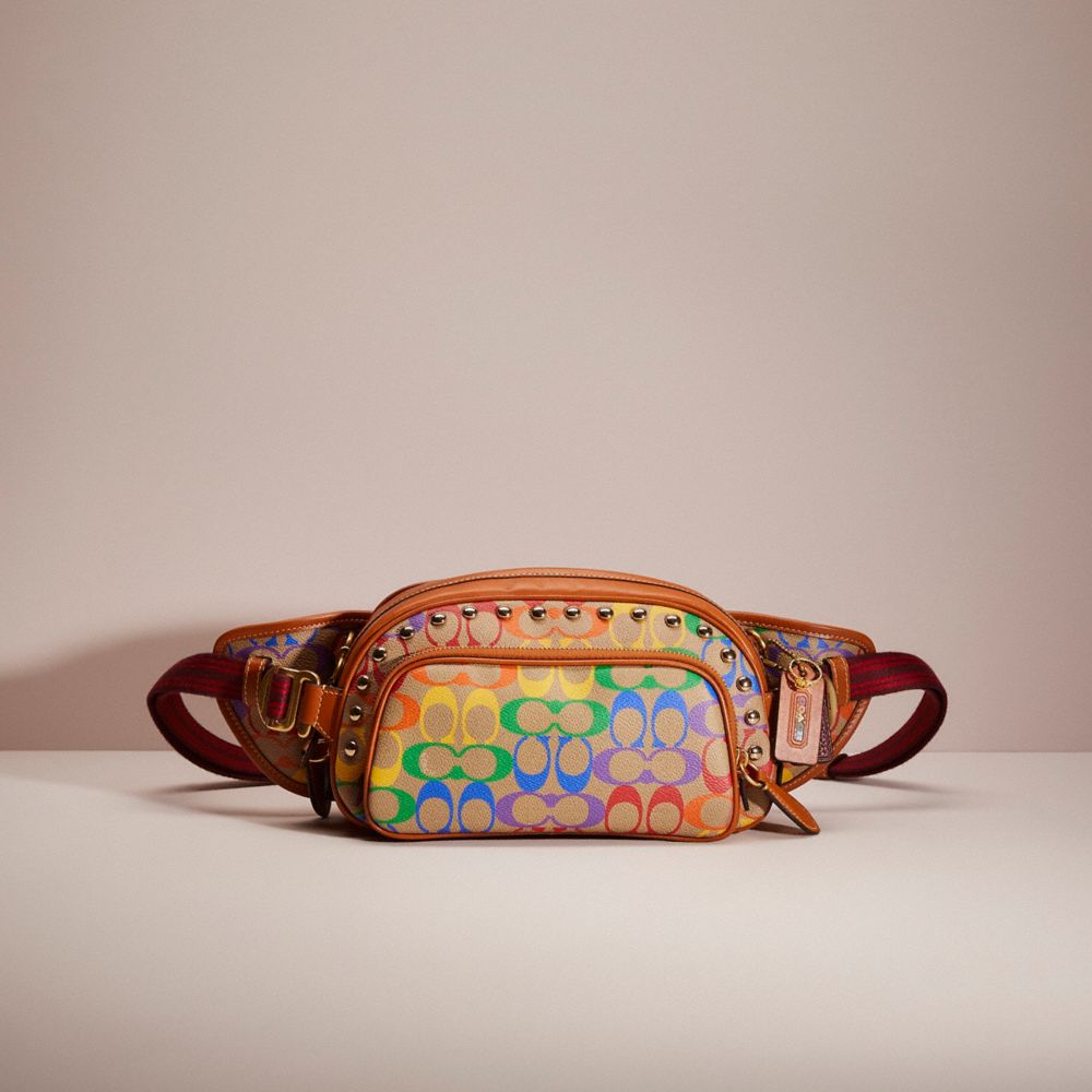 COACH®,UPCRAFTED HITCH BELT BAG IN RAINBOW SIGNATURE CANVAS,Brass/Saddle Multi,Front View