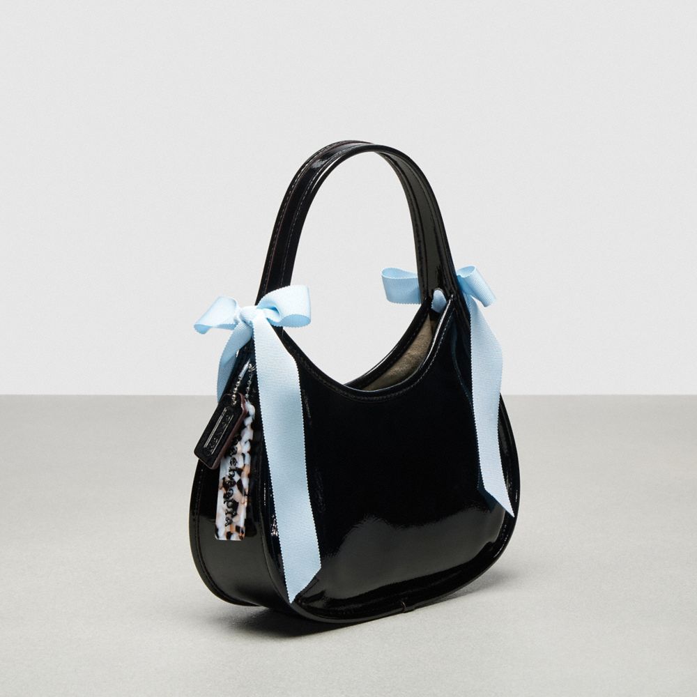 COACH®,Ergo Bag in Crinkle Patent Coachtopia Leather with Bows,Bow Bags,Black/Pale Blue,Angle View