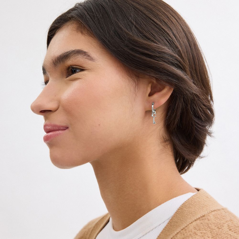 COACH®,スター パッドロック アンド キー ミスマッチ ハギー ピアス,ピアス,