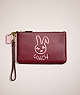 COACH®,RESTORED SMALL WRISTLET WITH RABBIT,Brass/Wine Multi,Front View