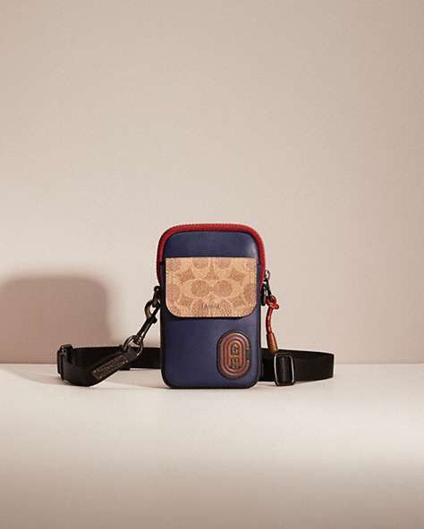 COACH®,RESTORED PACER CONVERTIBLE POUCH IN COLORBLOCK SIGNATURE CANVAS WITH COACH PATCH,Charcoal/Deep Sky,Front View