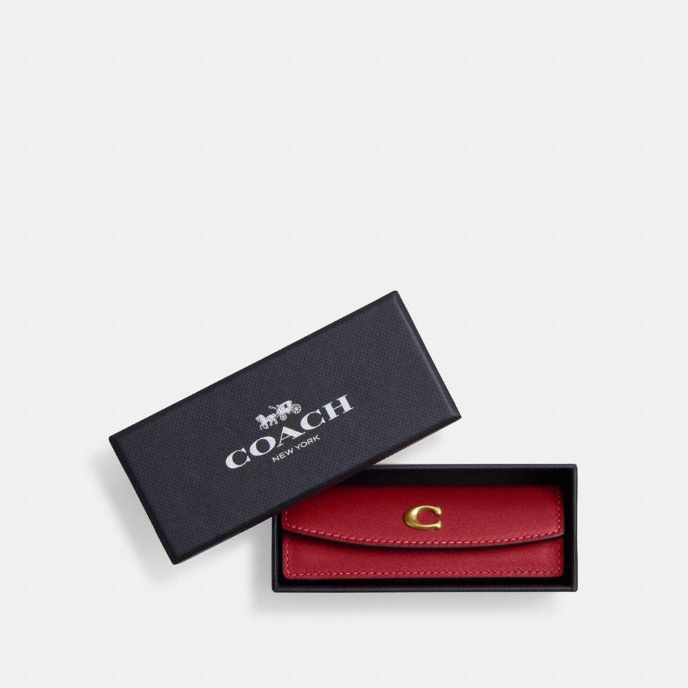 Coach Dice Set In Brass/ruby