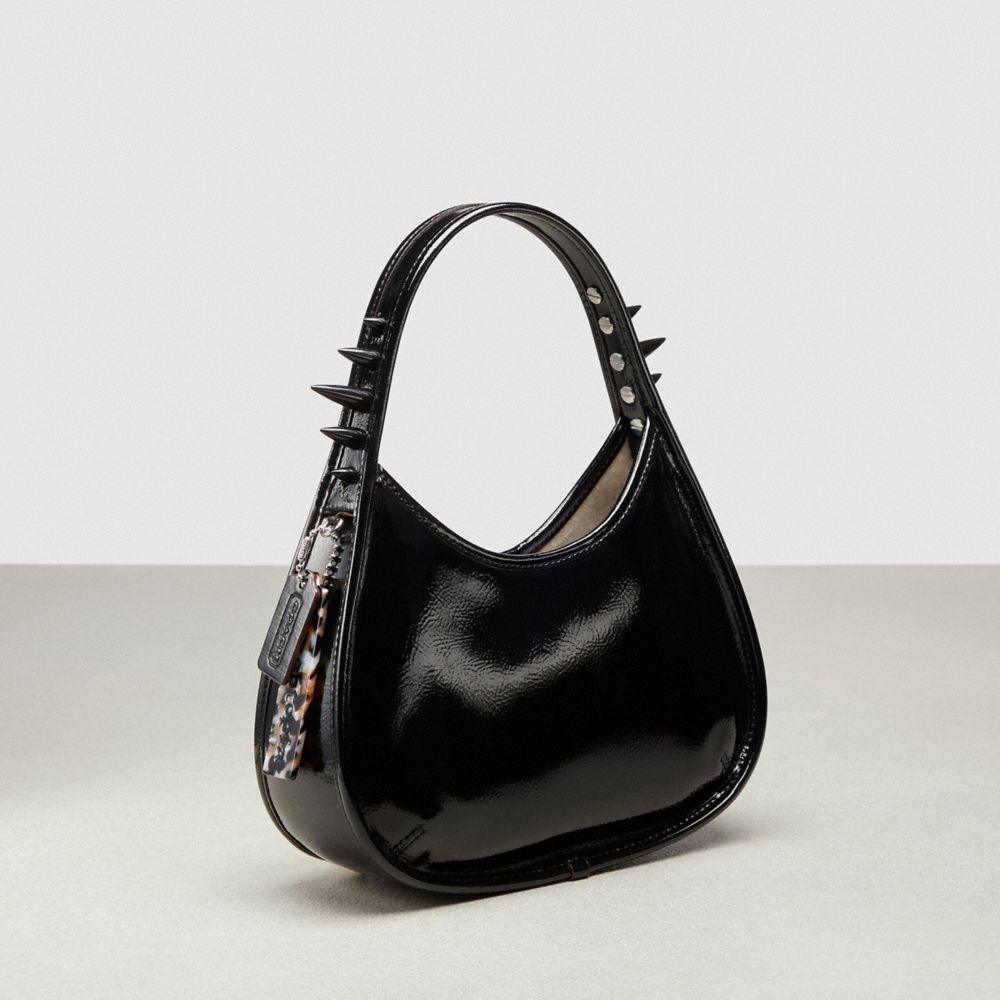 COACH®,Ergo Bag in Crinkle Patent Coachtopia Leather: Spikes,Small,Black,Angle View
