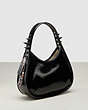 COACH®,Ergo Bag in Crinkle Patent Coachtopia Leather: Spikes,Small,Black,Angle View