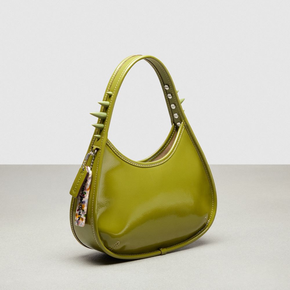 COACH®,Ergo Bag in Crinkle Patent Coachtopia Leather: Spikes,Small,Olive Green,Angle View