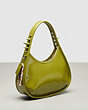 COACH®,Ergo Bag in Crinkle Patent Coachtopia Leather: Spikes,Small,Olive Green,Angle View