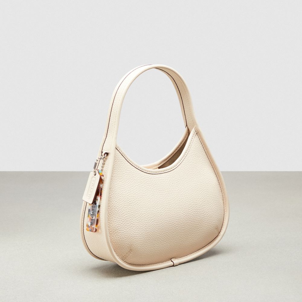 COACH®,Ergo Bag in Pebbled Coachtopia Leather: Grommets,Small,Cloud,Angle View