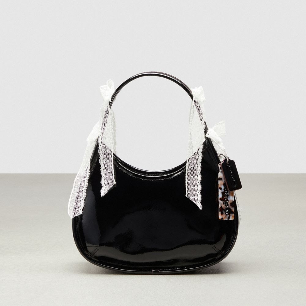 COACH®,Ergo Bag in Crinkle Patent Coachtopia Leather: Lace Bows,Small,Black/White.,Front View