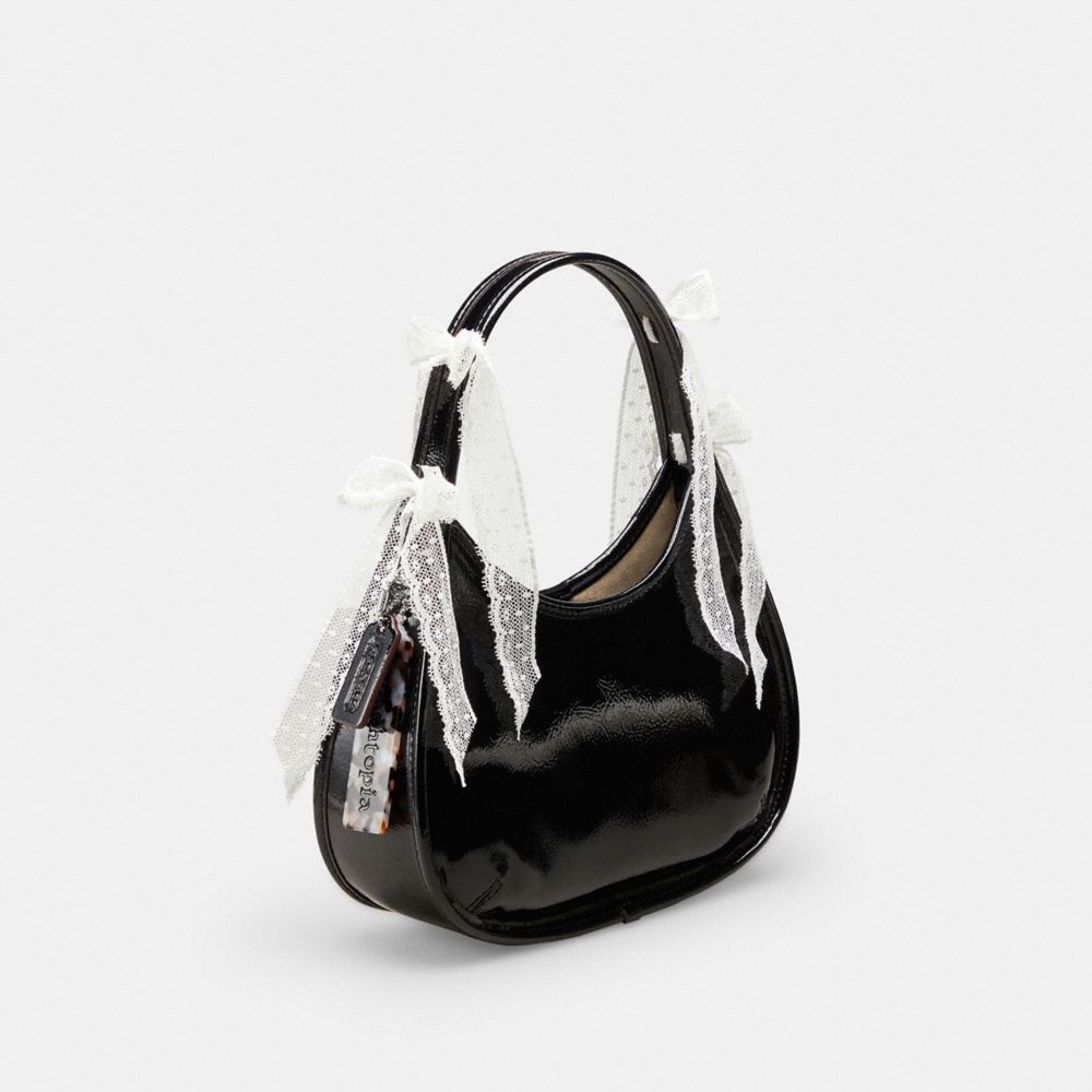 COACH®,Ergo Bag in Crinkle Patent Coachtopia Leather: Lace Bows,Small,Black/White.,Angle View