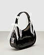 COACH®,Ergo Bag in Crinkle Patent Coachtopia Leather: Lace Bows,Small,Black/White.,Angle View